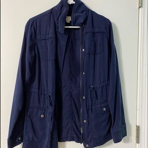 Utility jacket with functioning zipper and pockets